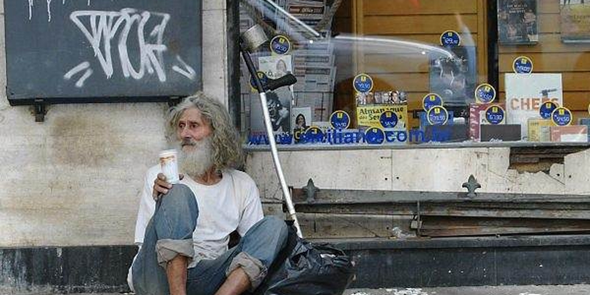 No meio do caminho havia um mendigo - Guiame