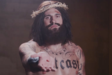 ídeo oficial do projeto "Jesus Tattoo", onde Jesus Cristo é representado como um tatuador que cura seus clientes.