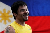 Manny Pacquiao é campeão mundial de boxe e agora pretende investir em sua carreira como político em seu país. (Foto: LA Times)
