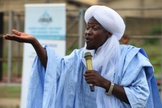 Líder muçulmano Soliu Kewugbemi em mensagem na Sociedade Nasrul-lahi-li Fathi. (Foto: AFP/Pius Utomi Ekpei)