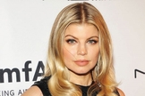 Tendo se tornado conhecida como vocalista do grupo 'The Black Eyed Peas', Fergie está agora investindo em sua carreira solo. (Foto: vibe.com)