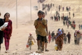 Crianças yazidis fugindo da violência do Estado Islâmico na cidade de Sinjar. (Foto: Reuters/Rodi Said)