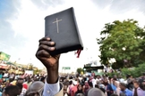 Cristãos protestam contra a perseguição religiosa no Sudão. (Foto: Ahmed MUSTAFA)