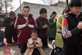 Cristãos participam de cerimônia na China. (Foto: Getty Images/Kevin Frayer)