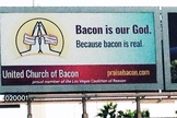 "Bacon é nosso Deus. Porque bacon é real", diz anúncio, em tradução livre. (United Church of Bacon)