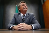 Jair Bolsonaro em seu gabinete na Câmara dos Deputados. (Foto: Igo Estrela/Estadão)