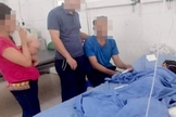 Família vietnamita sendo tratada no hospital após ataque. (Foto: Reprodução/Premier)