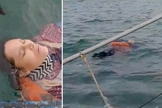 Angélica Gaitan é resgatada por pescadores após 8 horas no mar. (Foto: Rolando Visbal Lux / Newsflash)