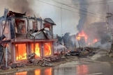 Pelo menos 18 casas e um prédio do governo foram queimados no município de Thantlang, no estado de Chin, em 18 de setembro, durante um confronto entre exército birmanês e as forças de resistência. (Foto: AFP)