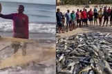 Após as redes transbordarem de peixes, pescadores e moradores oraram na praia. (Foto: Reprodução/Instagram/Metrópolis/Reprodução/GazetaWeb).