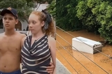 Elivandra e seu esposo Rulian sobreviveram à enchente. (Foto: Reprodução/TV Tribuna).