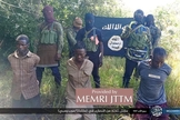 O Estado Islâmico divulgou fotos das execuções de cristãos em Moçambique. (Foto: Reprodução/MEMRI).