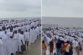 Uma multidão de pessoas foi batizada em uma praia na capital de Moçambique. (Foto: Reprodução/Instagram/gritoderuabr).