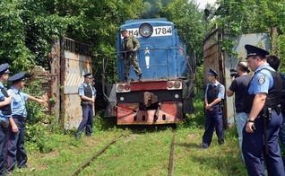 Trem levando 280 corpos resgatados do local do acidente do voo MH17 chega a Kharkiv, na Ucrânia