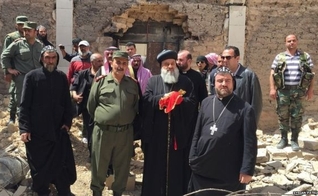 Apesar dos assassinatos, o chefe da Igreja Ortodoxa Síria, o Patriarca Inácio Aphrem II (ao centro), pretende restaurar a harmonia entre as religiões. (Foto: Patriarcado Sírio)