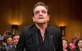 Bono Vox participou de audiência no Congresso Nacional dos EUA, nesta terça-feira. (Foto: AP)