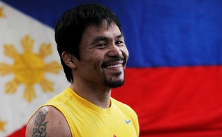 Manny Pacquiao é campeão mundial de boxe e agora pretende investir em sua carreira como político em seu país. (Foto: LA Times)