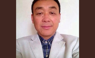 Zhang foi sentenciado no verão de 2014 por "reunir uma multidão para perturbar a ordem pública". (Foto: Reprodução).
