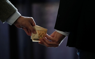 Corrupção. (Foto: Getty)
