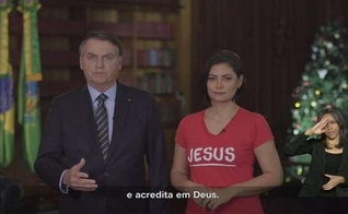 Jair e Michelle Bolsonaro em pronunciamento oficial de Natal. (Foto: Reprodução)