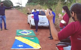 Moradores de Guarantã do Norte fazem corrente de oração para pacientes que estão internados com Covid-19. (Foto: Reprodução).