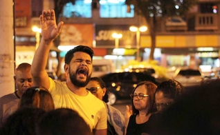 Aleff Amorim durante evangelismo de rua. (Foto: Aleff Amorim)