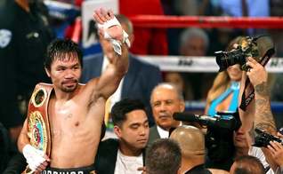 Manny Pacquiao após se tornar campeão do WBO peso meio-médio no Thomas & Mack Center em Las Vegas, em 2016. (Foto: Reuters/Las Vegas Sun/L.E. Baskow)