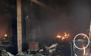 No círculo branco é possível ver a Bíblia intacta em meio às chamas. (Foto: Bombeiros de Maringá)