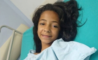 Ana Luíza, de 11 anos, está bem após ter sido baleada nas costas: "Milagre". (Foto: Reprodução/Facebook)