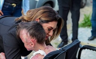 Primeira-dama Michelle Bolsonaro se emociona ao encontrar pacientes com doenças raras. (Foto: Reprodução/Twitter)