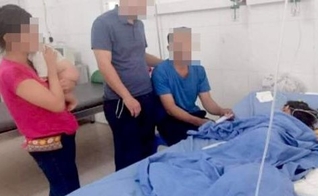 Família vietnamita sendo tratada no hospital após ataque. (Foto: Reprodução/Premier)