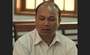 O Pr. A Dao foi preso por defender a liberdade religiosa em seu país. (Foto: Reprodução / USCIRF)