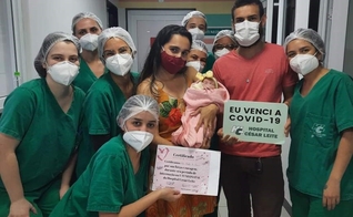 Na terça-feira, ao receber alta, os pais Tiago Paulo e Daiane registraram esse momento ao lado da equipe da UTIN do HCL. (Foto: Reprodução / Portal Caparaó)