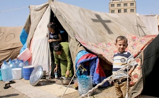 Cristãos sírios refugiados. (Foto: Reprodução / World Watch Monitor)