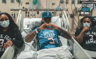 Damar Hamlin assiste ao jogo do Buffalo Bills da cama do hospital. (Captura de tela/YouTube/LOCAL 12)