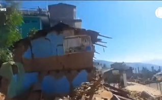 Cenas após terremoto no Nepal. (Captura de tela: YouTube/Record News)