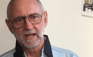 Hans-Joachim Lohre (Captura de tela: YouTube KircheinnotSchweiz)