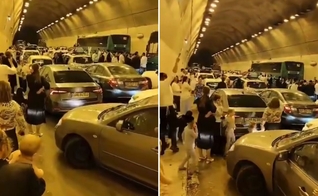 As pessoas no túnel. (Foto: Reprodução/Instagram/Hananya Naftali)