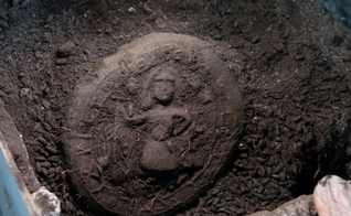 O pão com a imagem de Jesus. (Foto: Governo de Karadan).