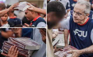 Voluntários distribuem Bíblias e oram pelos moradores da Vila Cruzeiro. (Foto: Universal.org)