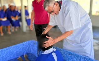 O batismo foi realizado na Penitenciária Feminina Maria Júlia Maranhão. (Foto: UNP Paraíba).
