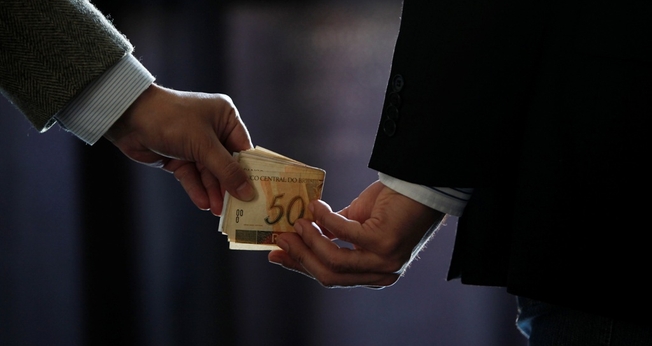 Corrupção. (Foto: Getty)
