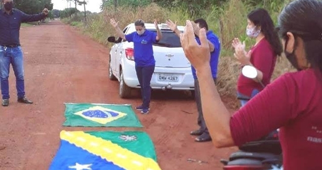 Moradores de Guarantã do Norte fazem corrente de oração para pacientes que estão internados com Covid-19. (Foto: Reprodução).