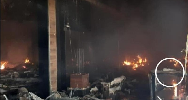 No círculo branco é possível ver a Bíblia intacta em meio às chamas. (Foto: Bombeiros de Maringá)