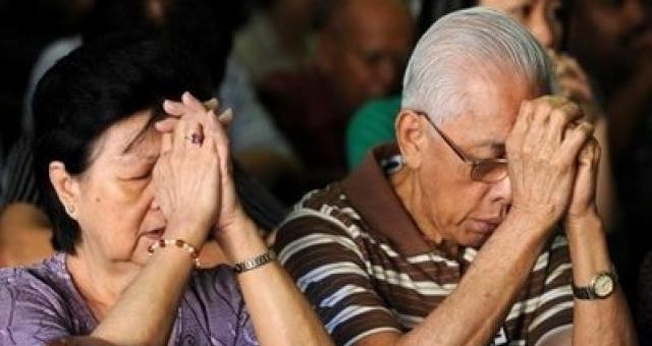  Spring e seus 9 irmãos foram proibidos de ir à igreja, mas não desistiram de ganhar os pais para Jesus. (Foto: Herald Malaysia). 