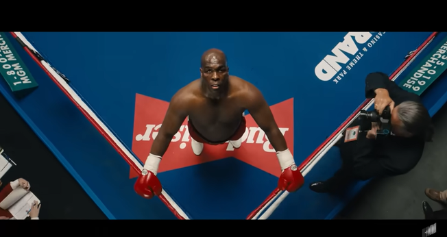 “Big George Foreman” vai contar a trajetória do atleta até ele se tornar um pregador. (Foto: Reprodução/YouTube/Sony Pictures Entertainment).