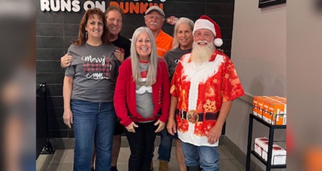 A equipe durante a festa de Natal. (Foto: Reprodução/AG News)