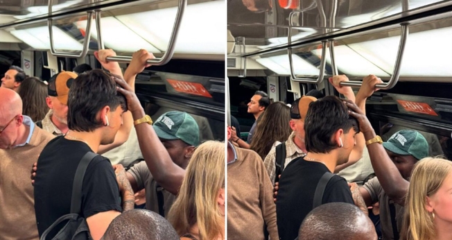 O evangelista orando pelo rapaz no metrô. (Foto: Reprodução/Instagram/Symphorien Bambi)