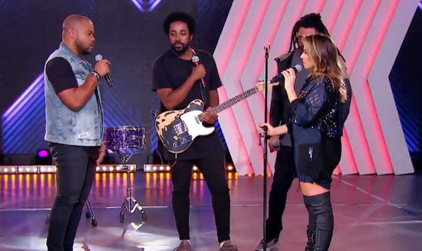 O grupo cantou "Fé na Vida" e o hit "Ninguém Explica Deus". (Foto: Reprodução).