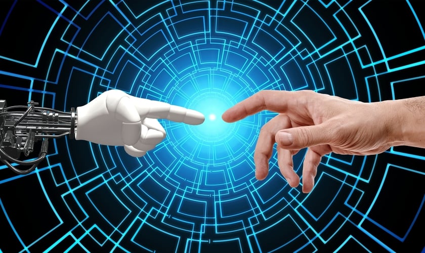 Mãos de robô e ser humano se encontram. (Foto: Piqsels)